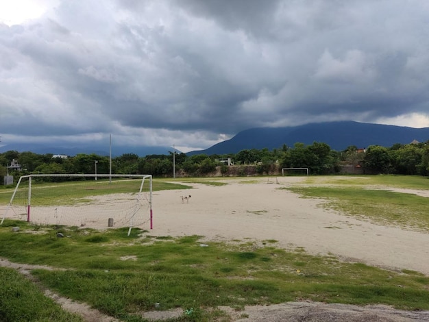 Foto campo deportivo met de fondo