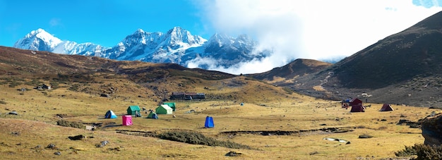 Campsite with tents on the top of high mountains