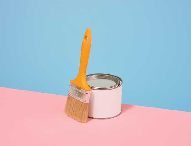 A can of paint and a brush Home improvement