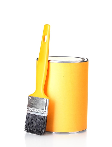 Can of paint with paintbrush isolated on white closeup