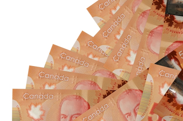 Canadese dollarbiljetten op een witte achtergrond