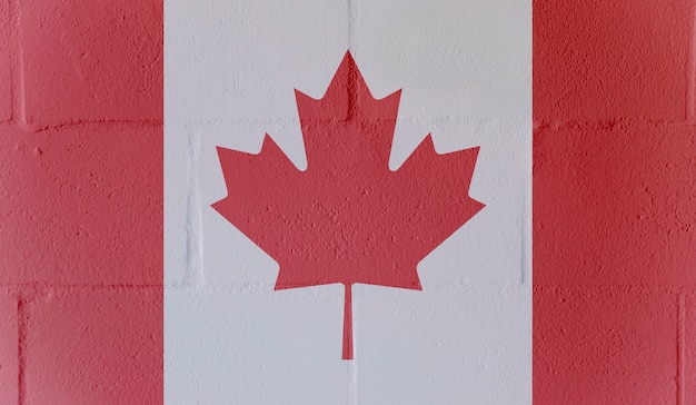 Foto canadese vlag met muurtextuur