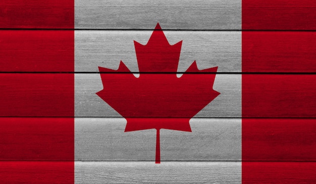 Photo canadian flag with wood texture