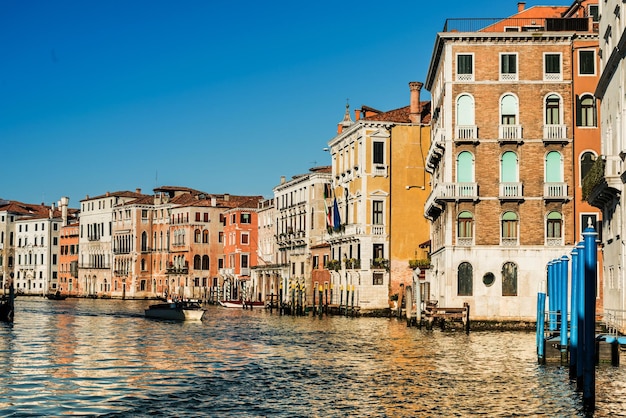 Canal passing through buildings in city