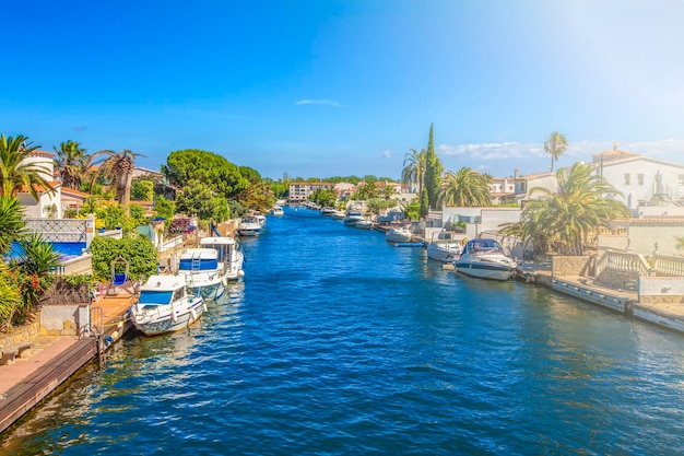 Canal with motor yachts spain empuriabrava on soft sunlight