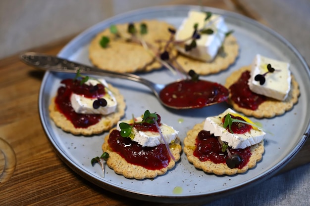 Canape with jam and brie cheese Healthy snack