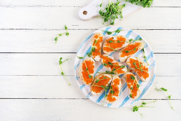 Canape with salmon red caviar