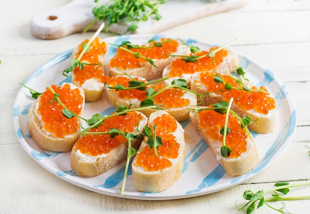 Canape with salmon red caviar