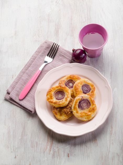 Canapes with mozzarella and onion