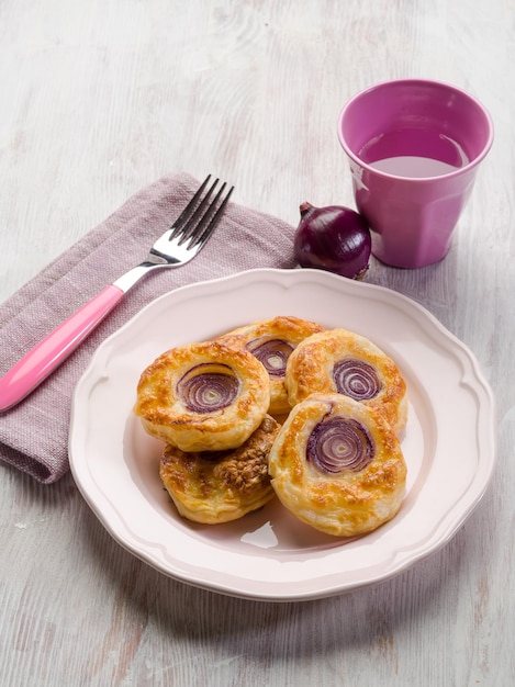 Canapes with mozzarella and onion