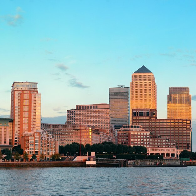 Canary Wharf business district in London at sunset.