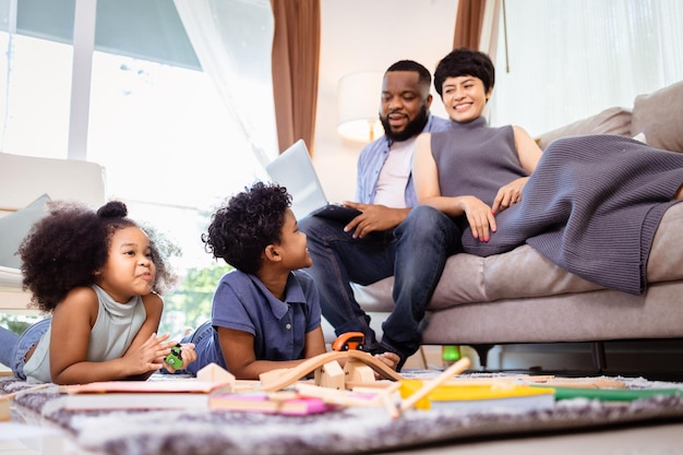 Candid Moments of African American Family Playing at Home Perfect for Lifestyle Content