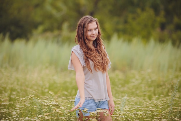 Candid skipping carefree adorable woman in field