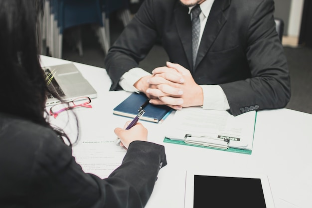 Photo candidate woman writing and complete application form