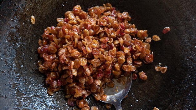 Candied fruit in pan  Bengal Currants  pickled