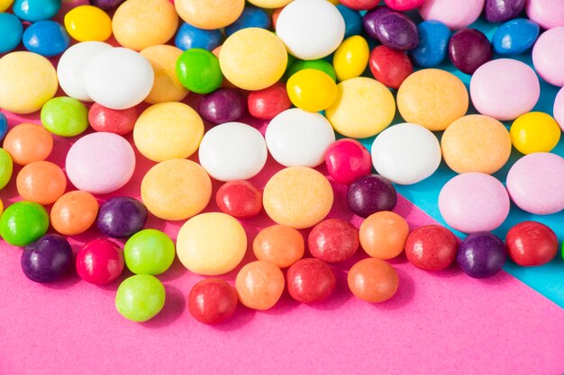 Candies on the colorful background high angle view