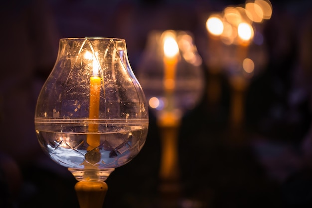 Candle in glass lantern at the night Buddha Makha Bucha Day with candle light for pray buddhists