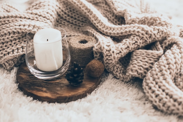 Candle and knitting clothes