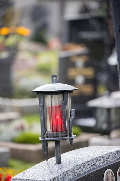 Candle lantern at the cemetery funeral sorrow