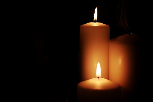 Candle light isolated black