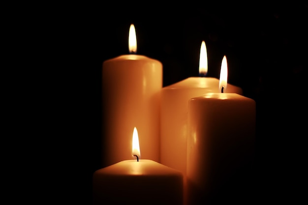 Candle light isolated black