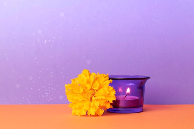 Candle and marigold flowers Day of the dead concept dia de los muertosDecoration of the altarcopy space