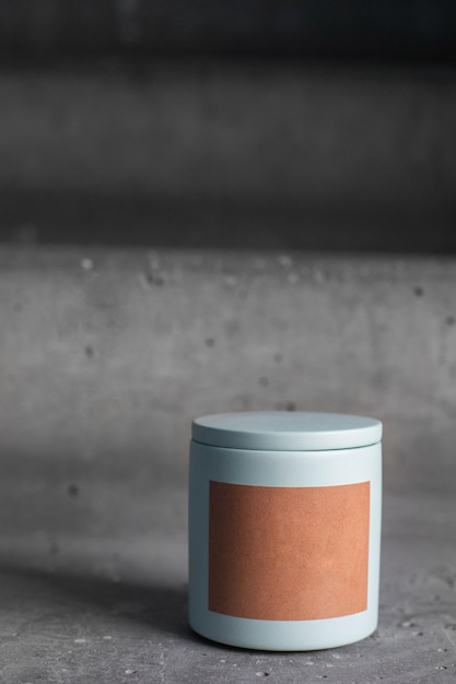 Candle packaging mockup on concrete background