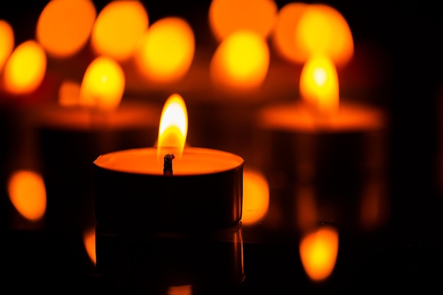 candlemany candles burn with a shallow depth of field