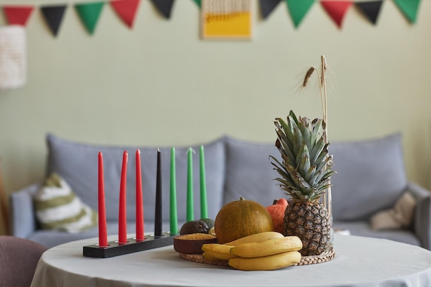 Photo candles and exotic fruits for kwanzaa holiday