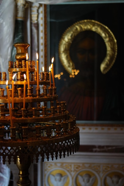 Candles on holders in church