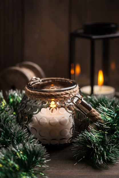 Candles in lanterns and Christmas decoration