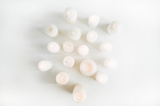 Candles set on white.