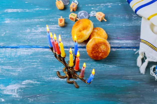 Photo candles and sweet food on wooden table