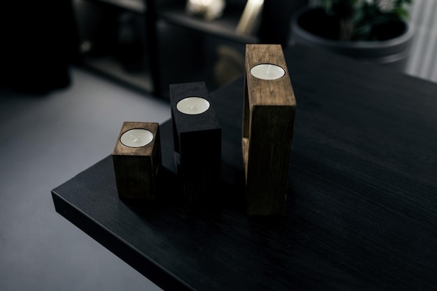 candles on a wooden stand