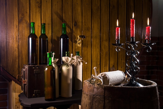 Photo candlestick in the wine cellar