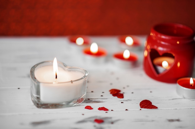 Candlestick with a heart shape and red candlestick