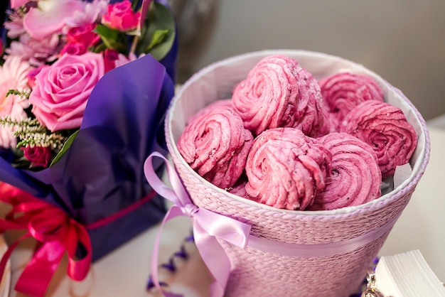 Candy bar decorated by delicious sweet buffet with cupcakes and other dessertscandieshappy birthday concept