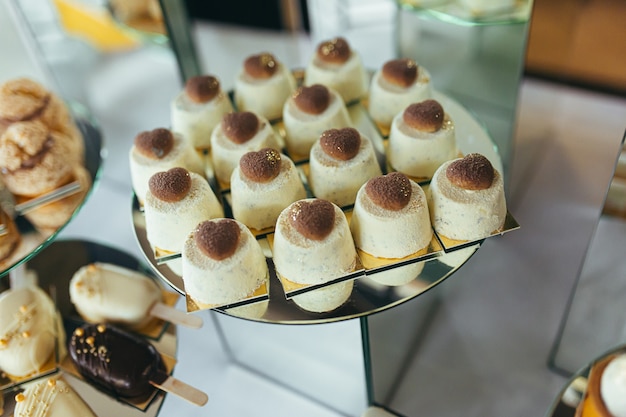 Candy bar. Delicious holiday reception on dessert table