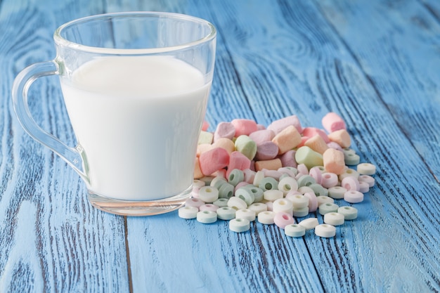 Candy on a blue pastel colored background