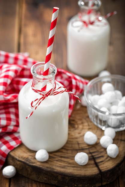 Photo candy canes in glass jar closeup