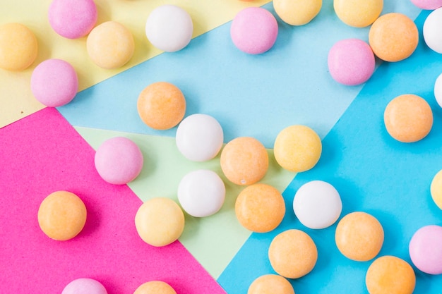 Candy on the colorful background high angle view