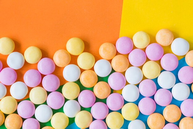 Candy on the colorful background high angle view