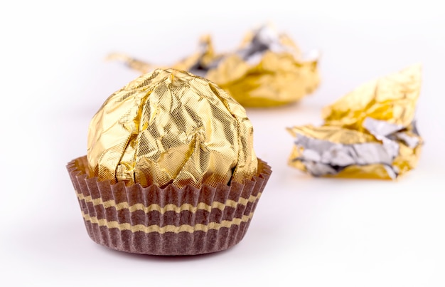 Candy in shiny wrapper isolated