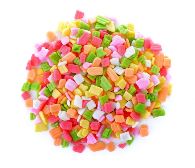 Candy on white wall