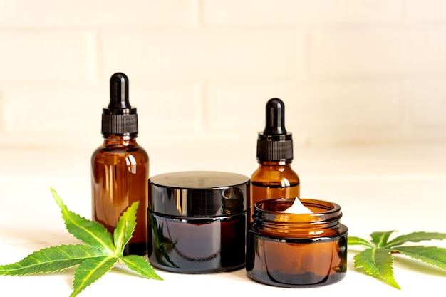 Cannabis face cream or serum or oil dropper concept. Natural cosmetic.