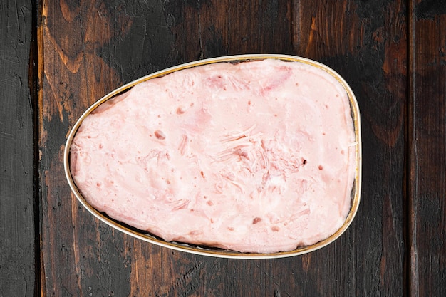 Canned food, luncheon meat ham set, on old dark  wooden table background, top view flat lay