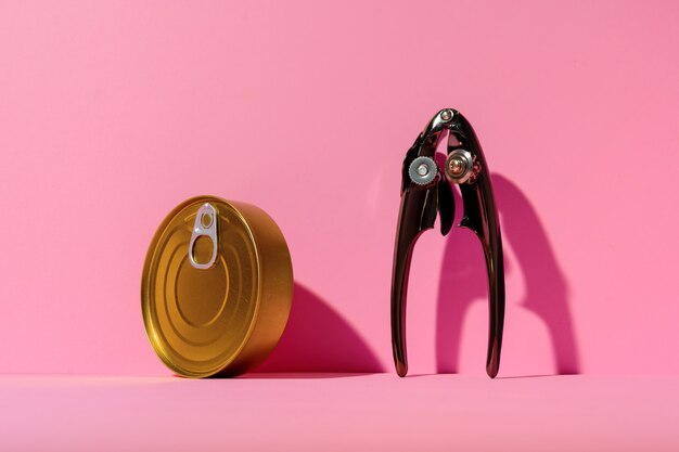 Canned food tin on pink studio background