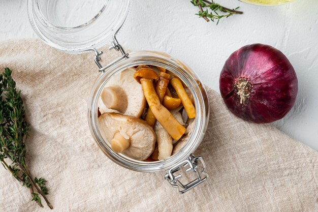 Canned mushrooms in oil set, on white