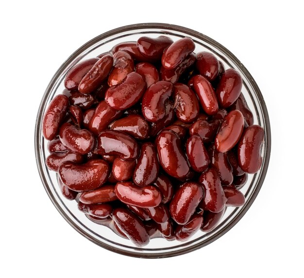 Canned red beans in a glass plate on a white background