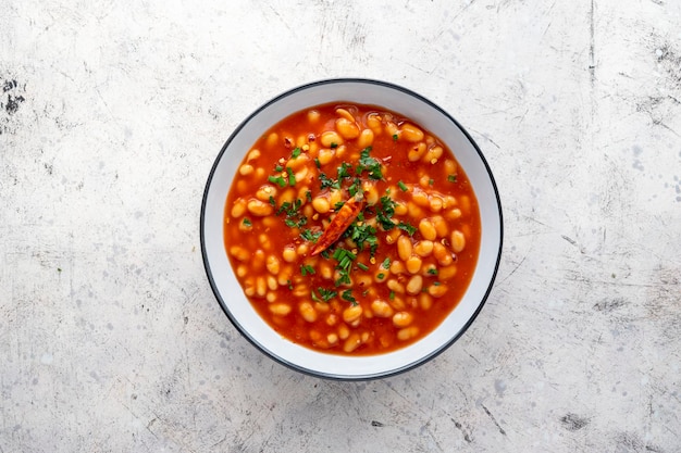 Canned red beans with tomato sauce in a bowl